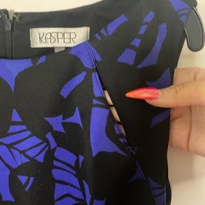 Kasper design dress with slits near sleeve.